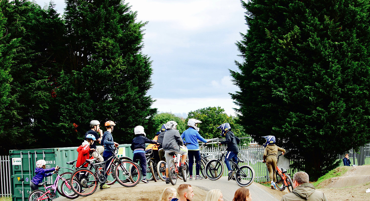 Photo of children riding on the BMX track